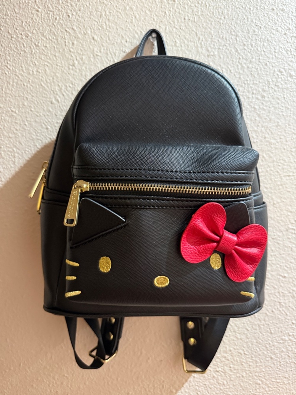 Loungefly Black Mini Hello Kitty Backpack with Gold Zipper Accents